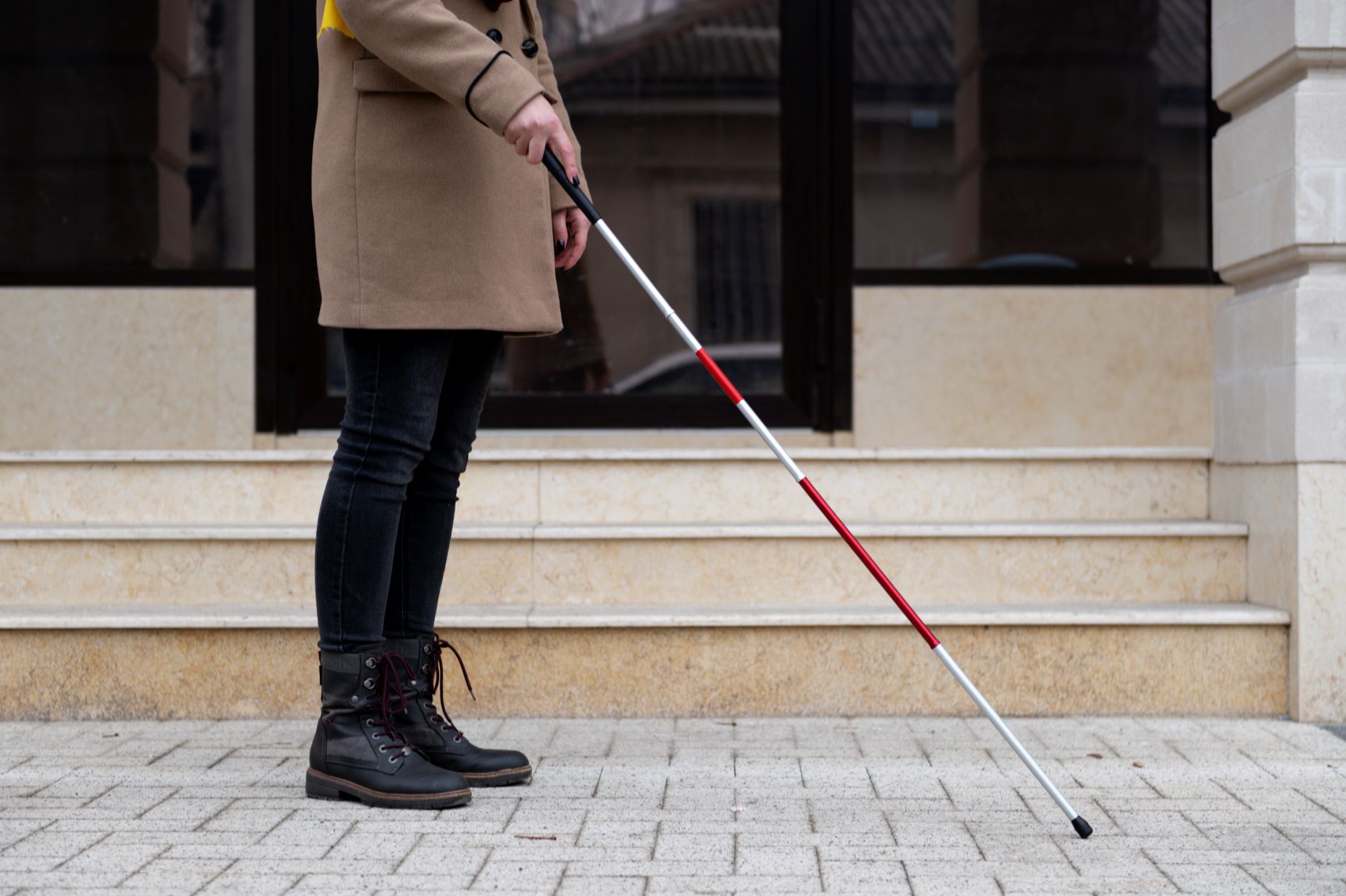 a photo of a blind woman to celebrate blindness awareness