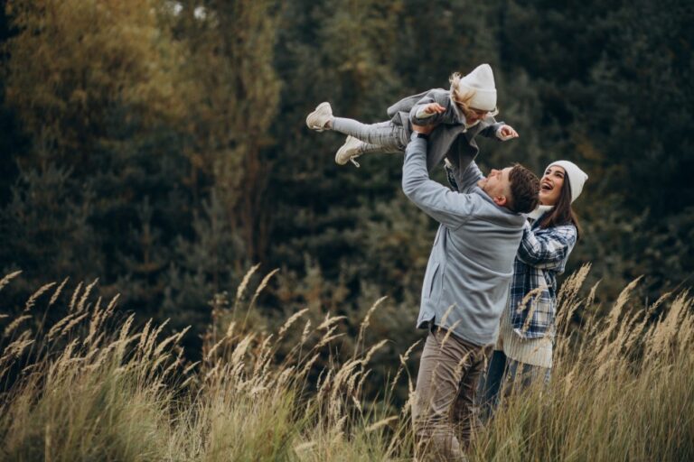 a photo of parents choosing the best parenting style in loving their child