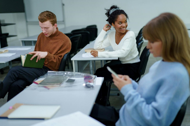 A classroom with three students