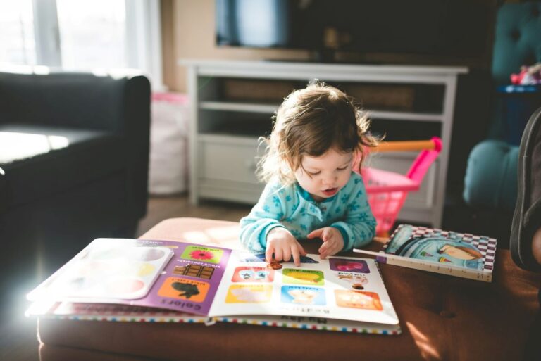 image of a child reading a children's book about friendly monsters