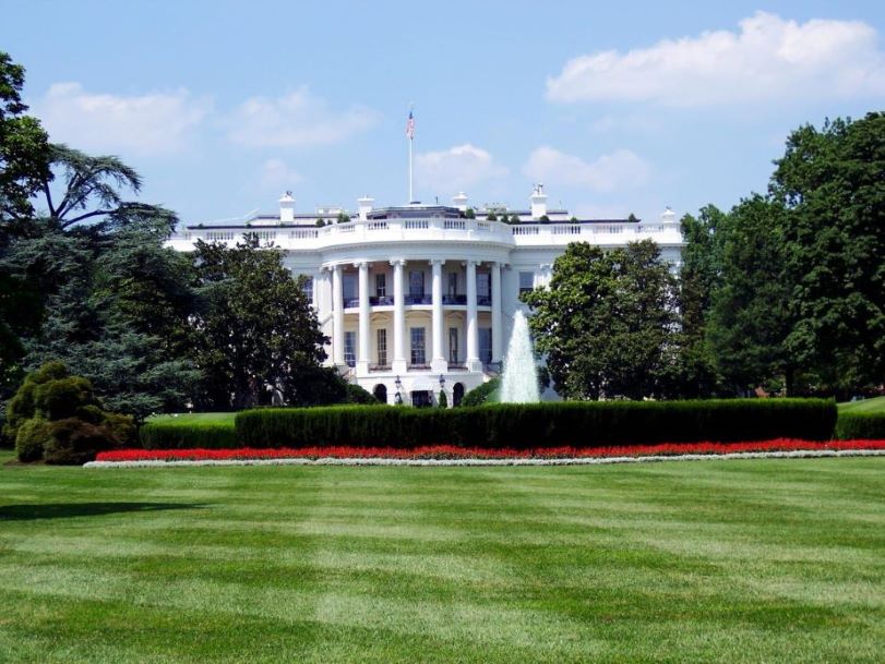 The White House with its lawn in the foreground.