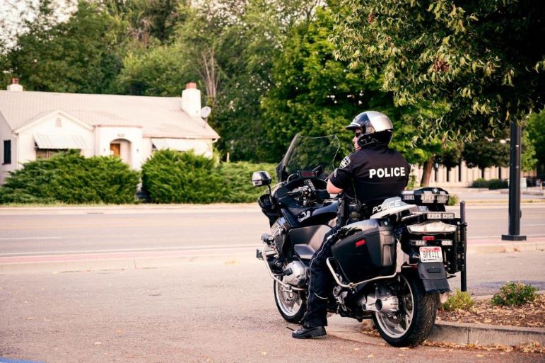 A police officer waiting on the job.