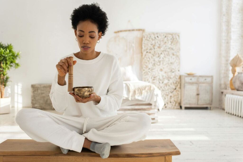 A woman preparing her instruments for healing