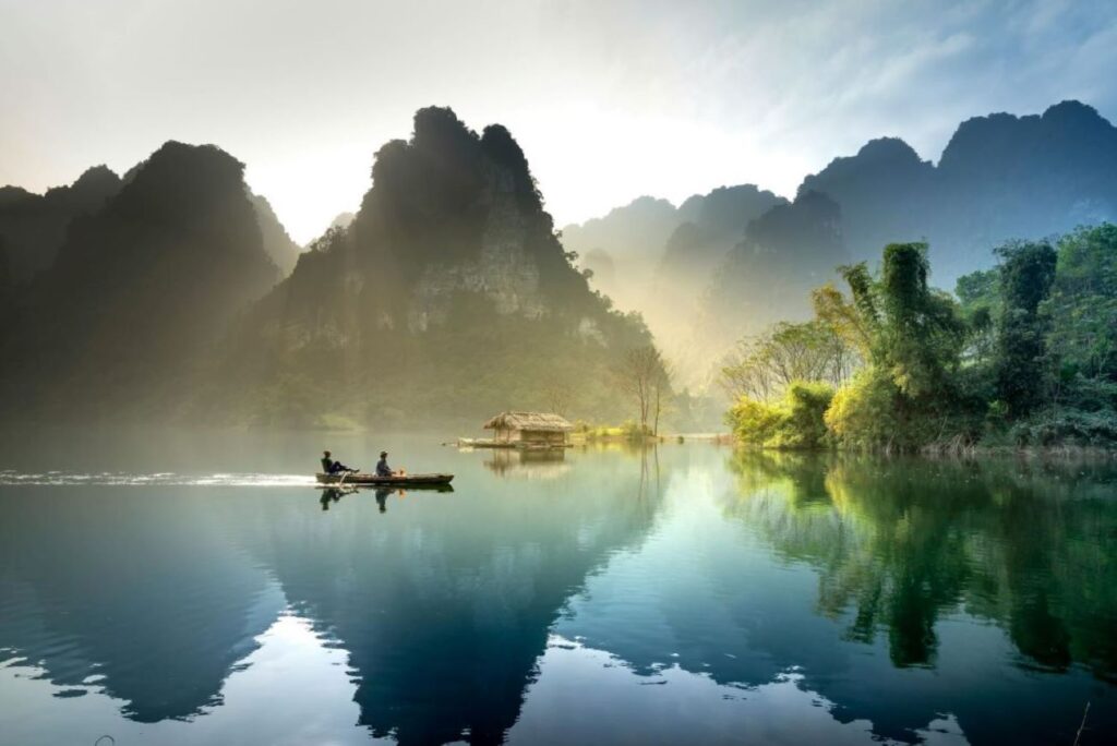 A river with mountains on the horizon.