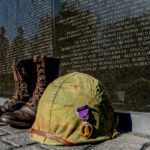 image of the memorial plaque with boots and a helmet portraying homelessness among veterans