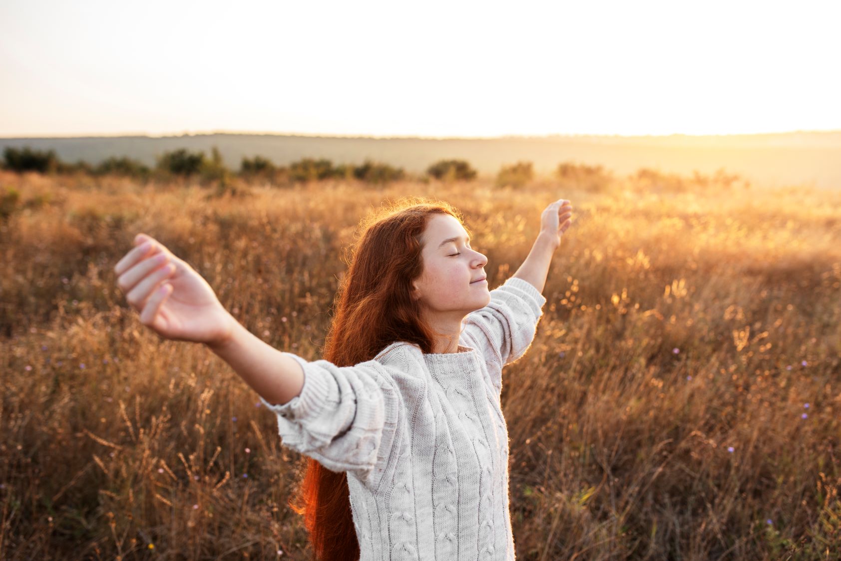 a photo of a girl enjoying freedom showing what God wants from people