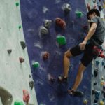 A man climbing a wall.