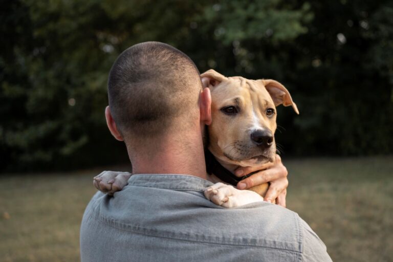 a photo of a man showing the joys of a pet sitter