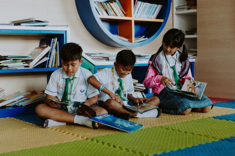 a photo of children reading books for their emotional and mental well-being